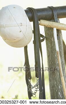 Stock Photography - close-up of polo 
tack with polo 
mallet and a sports 
helmet. fotosearch 
- search stock 
photos, pictures, 
images, and photo 
clipart