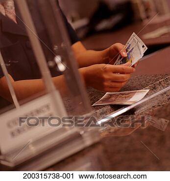 Stock Photography - teller counting 
banknotes on bank 
counter, close-up, 
mid section. fotosearch 
- search stock 
photos, pictures, 
images, and photo 
clipart