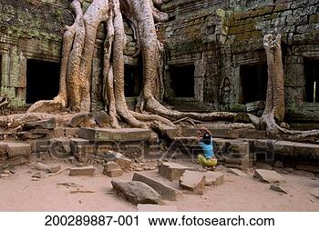 Stock Photography - cambodia, siem 
reap, angkor wat, 
young woman taking 
photograph. fotosearch 
- search stock 
photos, pictures, 
images, and photo 
clipart