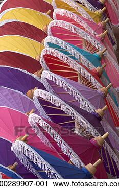 Stock Photography - umbrellas in a 
line, close-up. 
fotosearch - search 
stock photos, 
pictures, images, 
and photo clipart