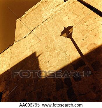 Stock Image - below view of 
a streetlight 
by a wall. fotosearch 
- search stock 
photos, pictures, 
images, and photo 
clipart