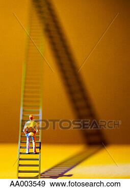 Stock Photograph - small human figurine 
standing on a 
tall ladder. fotosearch 
- search stock 
photos, pictures, 
images, and photo 
clipart