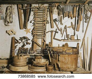 Stock Image - antique wooden 
containers and 
tools for cheese 
and milk production. 
fotosearch - search 
stock photos, 
pictures, images, 
and photo clipart