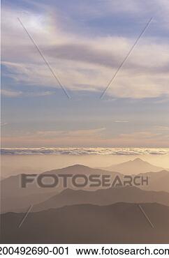 Stock Photography - australia, tasmania, 
southwest national 
park, mountains 
at sunset. fotosearch 
- search stock 
photos, pictures, 
images, and photo 
clipart