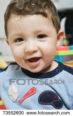 Stock Photography - baby boy (12-15 
months) smiling, 
portrait, close-up. 
fotosearch - search 
stock photos, 
pictures, images, 
and photo clipart