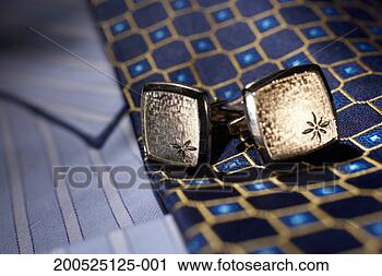 Stock Photography - cuff links, tie 
and button down 
shirt, close-up. 
fotosearch - search 
stock photos, 
pictures, images, 
and photo clipart