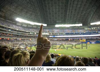 Stock Photography - spectator raising 
finger at baseball 
game, close-up. 
fotosearch - search 
stock photos, 
pictures, images, 
and photo clipart