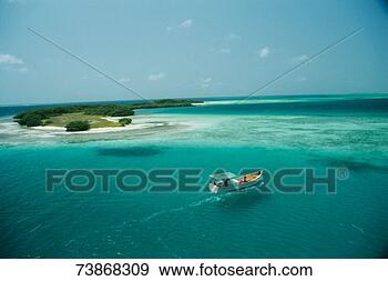 Stock Photograph - venezuela, los 
roques, boat on 
water, elevated 
view. fotosearch 
- search stock 
photos, pictures, 
images, and photo 
clipart