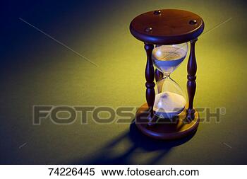 Stock Image - 'hourglass in 
studio, close-up'. 
fotosearch - search 
stock photos, 
pictures, images, 
and photo clipart