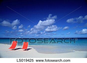 Stock Image - deck chairs on 
beach. fotosearch 
- search stock 
photos, pictures, 
images, and photo 
clipart