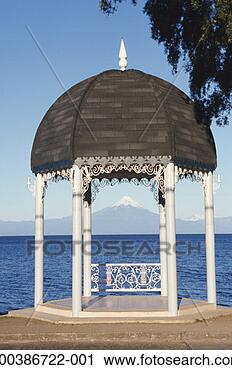 Stock Photography - chile, lake llanquihue, 
view of osorno 
volcano through 
rotunda. fotosearch 
- search stock 
photos, pictures, 
images, and photo 
clipart