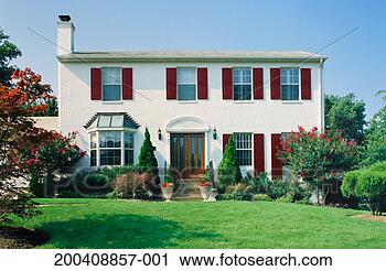 Stock Photography - exterior of brick 
home with crape 
myrtle and japanese 
maple. fotosearch 
- search stock 
photos, pictures, 
images, and photo 
clipart