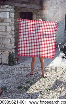 Stock Photography - france, charente, 
boy (6-8) holding 
up cloth. fotosearch 
- search stock 
photos, pictures, 
images, and photo 
clipart