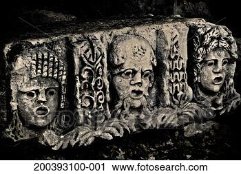 Stock Photography - stone faces in 
ruins near the 
roman amphitheater, 
myra, turkey. 
fotosearch - search 
stock photos, 
pictures, images, 
and photo clipart