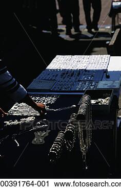 Stock Photography - street merchant 
selling jewellery. 
fotosearch - search 
stock photos, 
pictures, images, 
and photo clipart