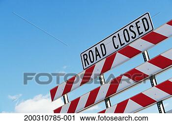 Stock Photography - barrier with road 
closed sign, low 
angle view. fotosearch 
- search stock 
photos, pictures, 
images, and photo 
clipart