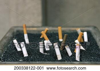 Stock Photography - cigarette stubs 
in ashtray, close-up. 
fotosearch - search 
stock photos, 
pictures, images, 
and photo clipart