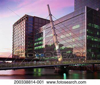 Stock Photography - england, london, 
canary wharf, 
wilkinson bridge, 
dusk. fotosearch 
- search stock 
photos, pictures, 
images, and photo 
clipart