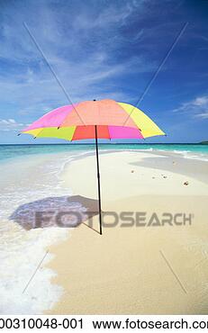 Stock Photography - grenada, beach 
umbrella on sand 
bar. fotosearch 
- search stock 
photos, pictures, 
images, and photo 
clipart