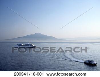 Stock Photography - italy, ferries 
crossing bay of 
naples, mount 
vesuvius on horizon. 
fotosearch - search 
stock photos, 
pictures, images, 
and photo clipart