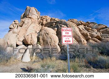 Stock Photography - reserved parking 
sign in front 
of granite boulders. 
fotosearch - search 
stock photos, 
pictures, images, 
and photo clipart