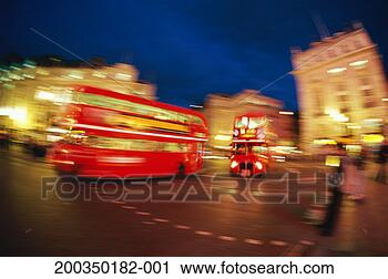 Stock Photography - england, london, 
piccadilly circus, 
buses at night 
(blurred motion). 
fotosearch - search 
stock photos, 
pictures, images, 
and photo clipart