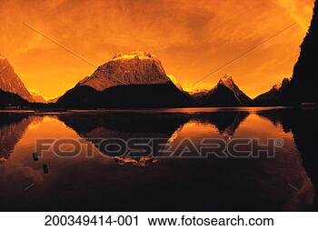 Stock Photography - new zealand, milford 
sound and mitre 
peak, (orange 
filter, fish eye). 
fotosearch - search 
stock photos, 
pictures, images, 
and photo clipart