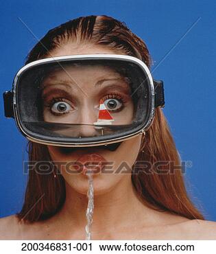 Stock Photography - woman wearing 
scuba mask, spitting 
water, close-up. 
fotosearch - search 
stock photos, 
pictures, images, 
and photo clipart