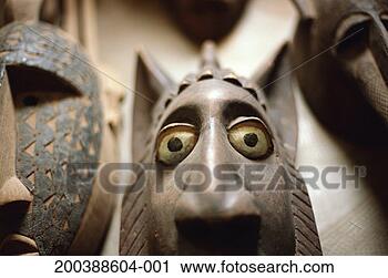 Stock Photography - carved ceremonial 
masks, close-up. 
fotosearch - search 
stock photos, 
pictures, images, 
and photo clipart