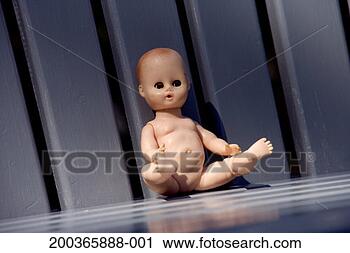 Stock Photography - child's doll on 
slatted bench. 
fotosearch - search 
stock photos, 
pictures, images, 
and photo clipart