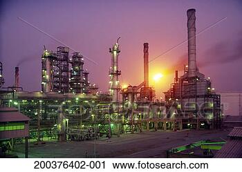 Stock Photography - glowing flame 
of flare stack 
burning waste 
gas at oil refinery, 
dusk. fotosearch 
- search stock 
photos, pictures, 
images, and photo 
clipart