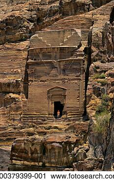 Stock Photography - jordan, petra, 
mature man standing 
in doorway of 
palace tomb. fotosearch 
- search stock 
photos, pictures, 
images, and photo 
clipart