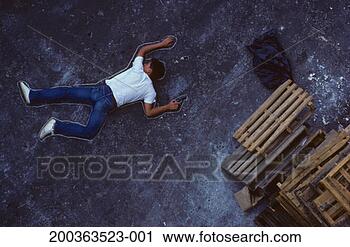 Stock Photography - man with gun lying 
on ground, chalk 
outline around 
him, elevated 
view. fotosearch 
- search stock 
photos, pictures, 
images, and photo 
clipart