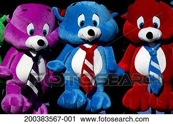 Stock Photography - row of teddy bears 
hanging from booth 
in amusement park. 
fotosearch - search 
stock photos, 
pictures, images, 
and photo clipart