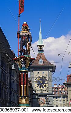 Stock Photography - switzerland, berne, 
clock tower and 
statue at zahringer 
fountain. fotosearch 
- search stock 
photos, pictures, 
images, and photo 
clipart