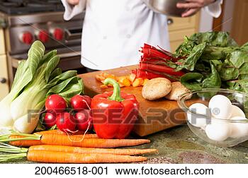 Stock Photography - eggs and selection 
of vegetables 
in kitchen, close-up. 
fotosearch - search 
stock photos, 
pictures, images, 
and photo clipart