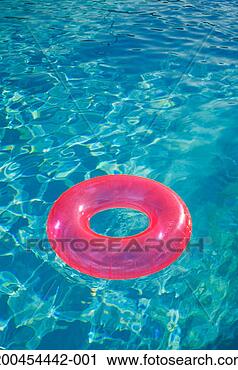 Stock Photography - inflatable ring 
in pool, elevated 
view. fotosearch 
- search stock 
photos, pictures, 
images, and photo 
clipart