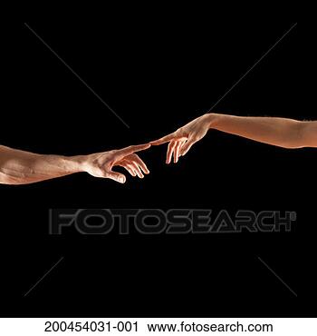 Stock Photography - man and woman 
touching fingertips. 
fotosearch - search 
stock photos, 
pictures, images, 
and photo clipart
