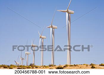 Stock Photography - row of wind turbines. 
fotosearch - search 
stock photos, 
pictures, images, 
and photo clipart