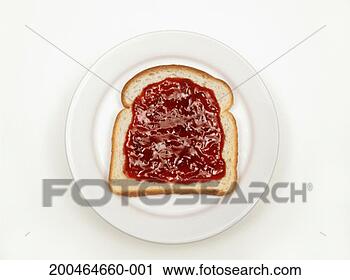 Stock Photography - slice of bread 
covered with jam, 
overhead view. 
fotosearch - search 
stock photos, 
pictures, images, 
and photo clipart
