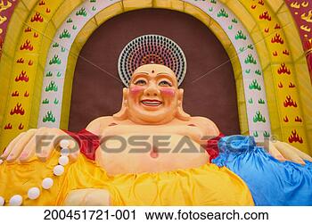 Stock Photography - smiling buddha, 
low angle view. 
fotosearch - search 
stock photos, 
pictures, images, 
and photo clipart