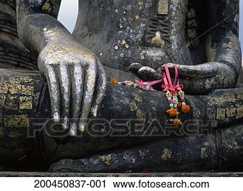 Stock Photography - statue of buddha, 
close-up. fotosearch 
- search stock 
photos, pictures, 
images, and photo 
clipart