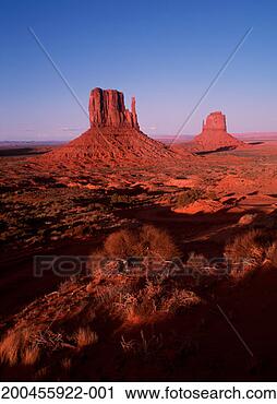 Stock Photography - usa, utah, monument 
valley, mittens, 
dusk. fotosearch 
- search stock 
photos, pictures, 
images, and photo 
clipart