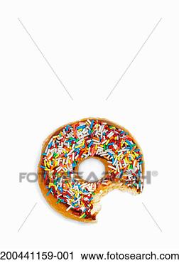 Stock Photography - doughnut covered 
in hundreds and 
thousands with 
bite taken, close-up. 
fotosearch - search 
stock photos, 
pictures, images, 
and photo clipart