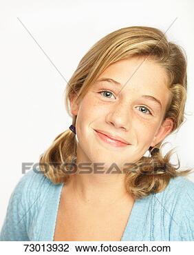 Stock Photo - girl (12-13) smiling, 
portrait, close-up. 
fotosearch - search 
stock photos, 
pictures, images, 
and photo clipart