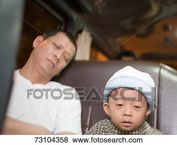Stock Photo - grandfather with 
grandson (4-5) 
in van, grandfather 
sleeping. fotosearch 
- search stock 
photos, pictures, 
images, and photo 
clipart