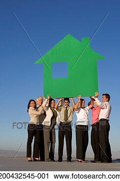 Stock Photography - group of business 
people holding 
green model house 
on roof. fotosearch 
- search stock 
photos, pictures, 
images, and photo 
clipart