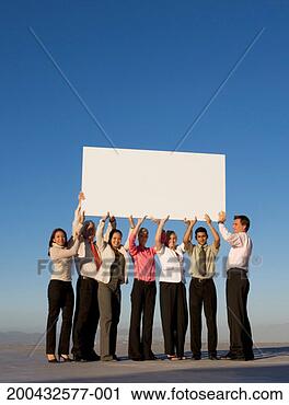 Stock Photography - group of business 
people holding 
a blank board 
on roof. fotosearch 
- search stock 
photos, pictures, 
images, and photo 
clipart