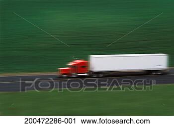 Stock Photography - truck driving 
along road (blurred 
motion), elevated 
view, side view. 
fotosearch - search 
stock photos, 
pictures, images, 
and photo clipart