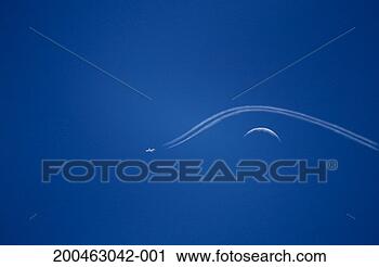 Stock Photography - aeroplane creating 
vapour trail around 
moon, low angle 
view. fotosearch 
- search stock 
photos, pictures, 
images, and photo 
clipart